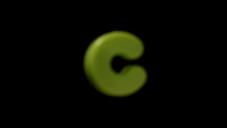 The-letter-c-coming-into-focus-on-black-background