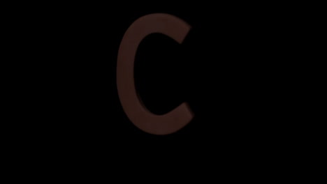 The-letter-c-rising-on-black-background
