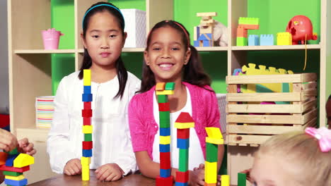 Cute-classmates-playing-with-building-blocks