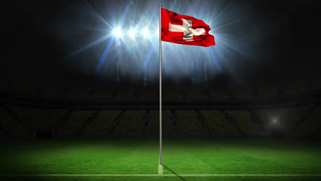 Switzerland-national-flag-waving-on-flagpole