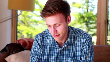 Handsome-young-man-relaxing-having-coffee