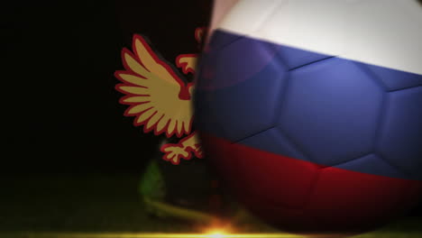 Footballspieler-Tritt-Den-Ball-Mit-Der-Russischen-Flagge