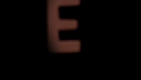 The-letter-e-rising-on-black-background