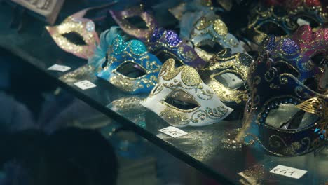 Colorful-Venetian-masks-on-display,-showcasing-intricate-designs-and-vibrant-colors