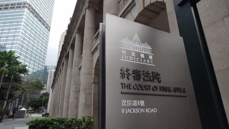 Shot-of-a-grey-board-with-"The-Court-Of-Final-Appeal"-printed-on-it-in-Hong-Kong,-China