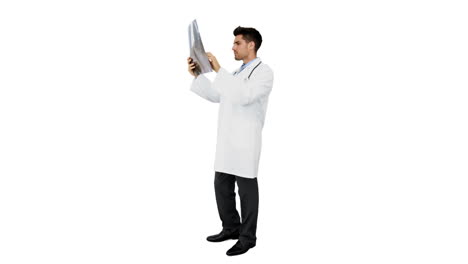 Young-doctor-standing-with-xray
