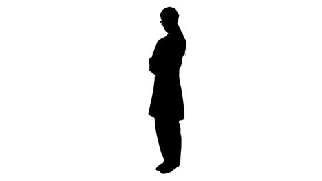 Silhouette-of-doctor-looking-at-camera