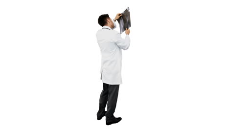 Young-doctor-standing-with-xray
