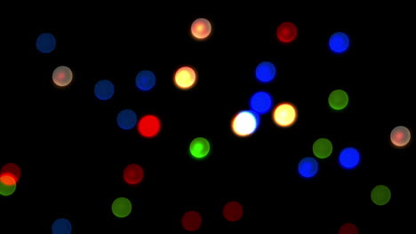 Glowing-circles-of-light-moving-on-black