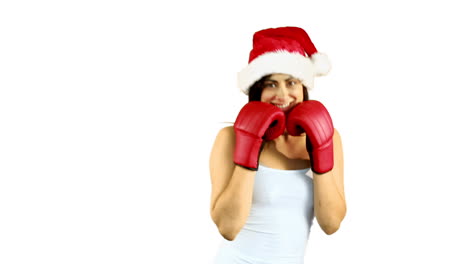 Festive-brunette-boxing-to-camera