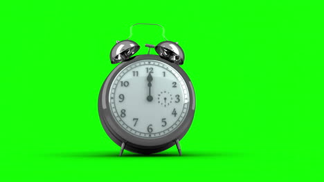 Alarm-clock-ringing-on-green-background