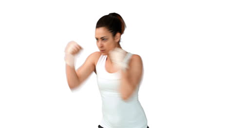 Fit-brunette-punching-with-bandaged-fists