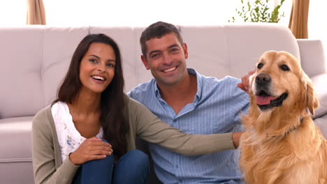 Happy-couple-with-their-dog