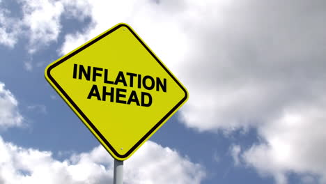 Inflation-ahead-sign-against-blue-sky-