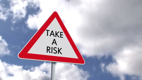 Take-a-risk-sign-against-blue-sky