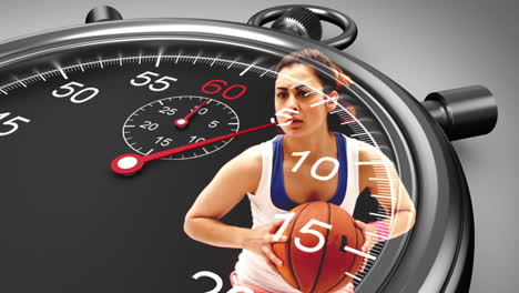 Stopwatch-graphic-over-basketball-player-in-slow-motion
