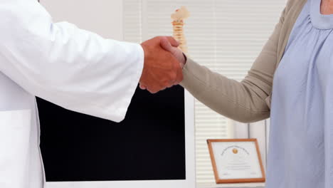 Patient-shaking-hands-with-doctor