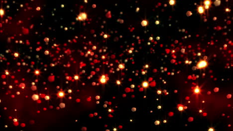 Esferas-De-Luz-Rojas-Brillantes-Sobre-Negro