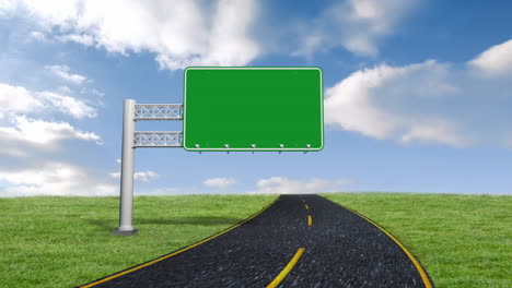 Green-road-sign-against-blue-sky-