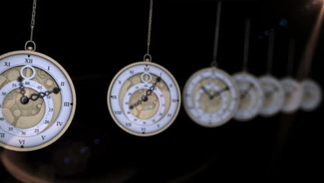 Hanging-pocket-watches-ticking-in-a-row