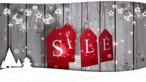 Red-sale-tags-hanging-against-wood-with-festive-border
