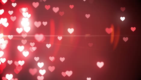 Glittering-hearts-on-red-background