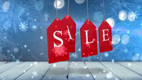 Red-sale-tags-hanging-against-glowing-background