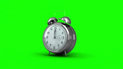 Alarm-clock-ringing-on-green-background