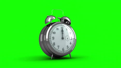 Alarm-clock-ringing-on-green-background
