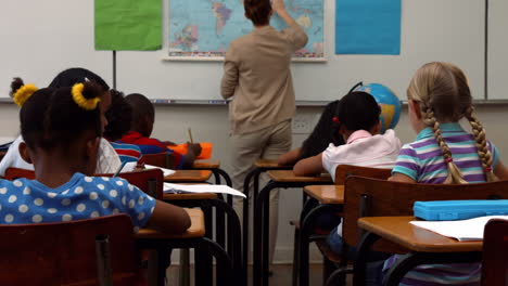 School-children-passing-notes-during-class