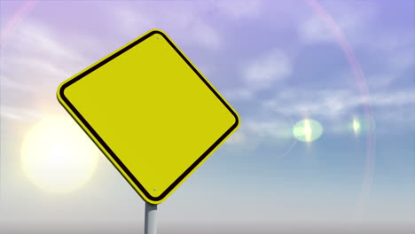 Empty-yellow-road-sign-against-changing-sky