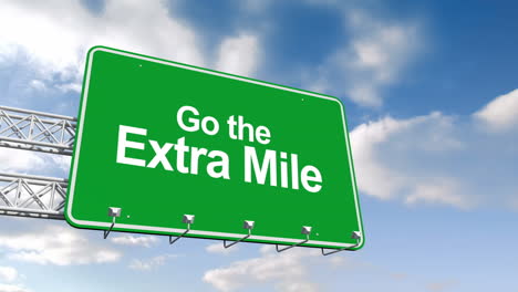 Go-the-extra-mile-sign-against-blue-sky-