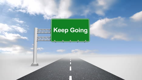 Keep-going-sign-over-open-road