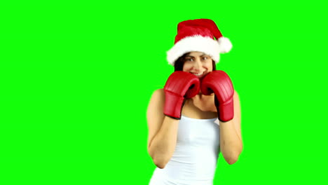 Festive-brunette-boxing-to-camera