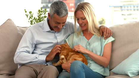 Happy-couple-with-their-cat