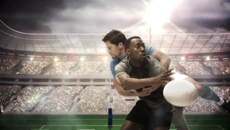 Serious-rugby-players-tackling-for-ball-