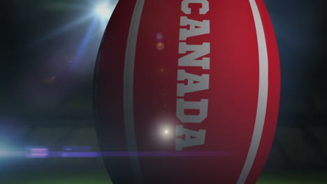 Canada-rugby-ball-in-stadium-with-flashing-lights-