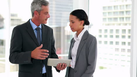 Business-people-using-tablet-computer