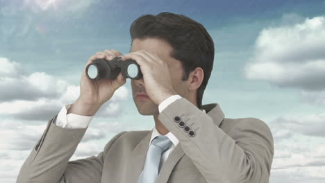 Businessman-looking-through-binoculars-against-blue-sky