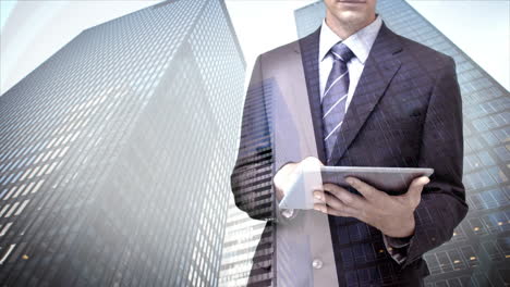 Businessman-using-tablet-computer-with-skyscraper-overlay-