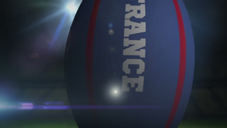 Frankreich-Rugby-Ball-Im-Stadion-Mit-Blinkenden-Lichtern-