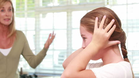 Upset-mother-scolding-her-daughter