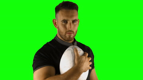 Serious-rugby-player-with-ball-