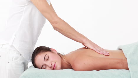 Woman-enjoying-a-back-massage
