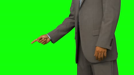 Close-up-of-businessman-pointing-with-his-finger