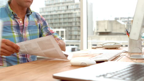 Businessman-looking-at-pictures