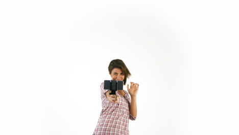 Pretty-girl-taking-selfie-with-smartphone