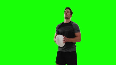 Serious-rugby-player-with-ball