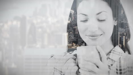 City-overlay-on-woman-drinking-coffee