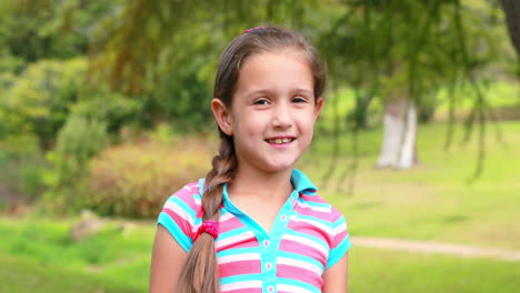 Happy-little-girl-looking-at-camera